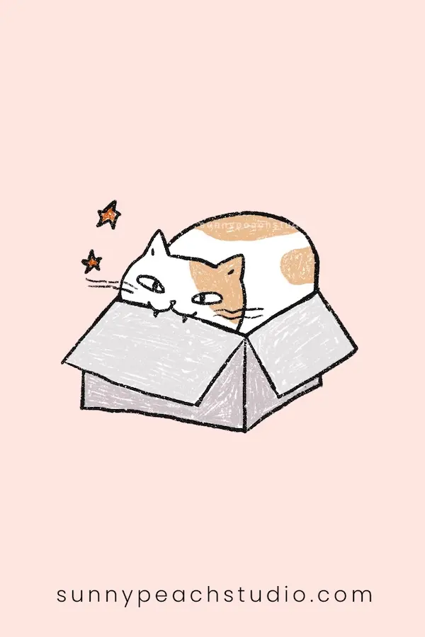 Cute orange and white cat curled up inside a cardboard box