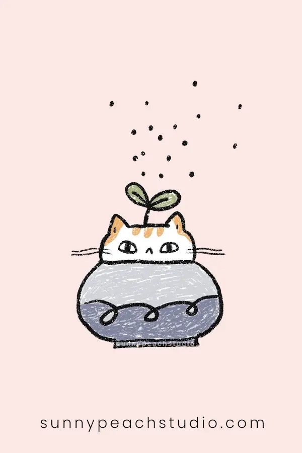 Cute cat-shaped planter with a small green plant growing from the top