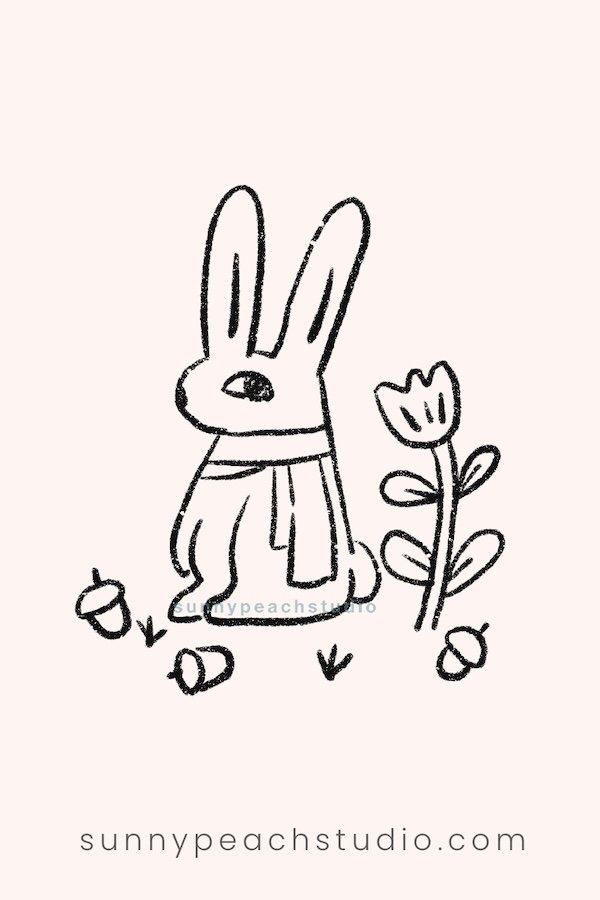 Outline drawing of a cute fall bunny wearing a scarf with acorns