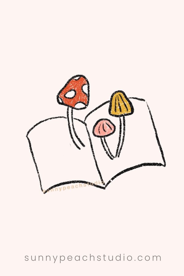 Cute fall drawing of colorful mushrooms growing from an open book