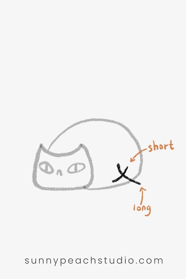 Drawing guide lines for a fall leaf beside the cat
