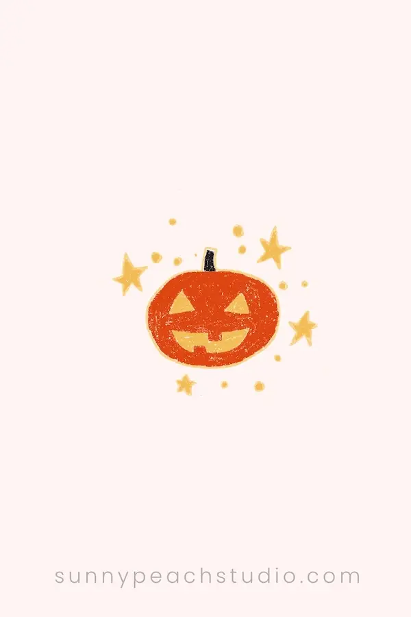 Orange pumpkin with glowing yellow face, stars, and dots