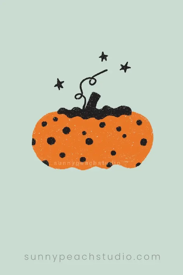 Cute orange pumpkin drawing with black polka dots and small stars